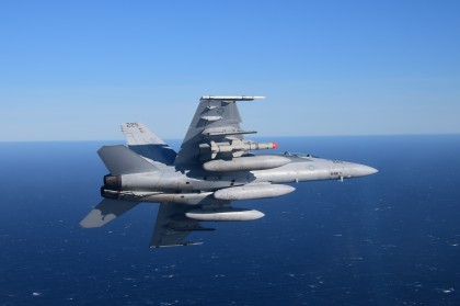 An FA-18 carries the new Harpoon Block II+ missile