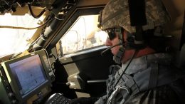 U.S. solider uses a communication terminal during network evaluation event