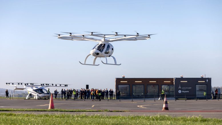 Crewed Volocopter 2x flies in front of ADP and Skyports Vertiport at Pontoise-Cormeille testbed