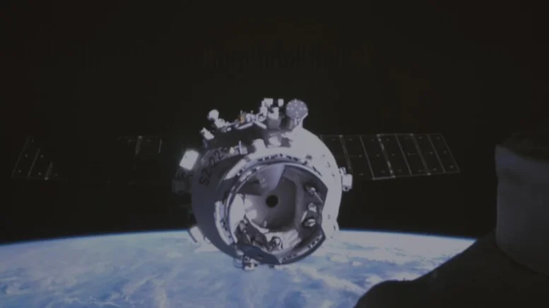 Shenzhou-22 spaceship docking with the space station combination. (Xinhua/Wang Chuntao)